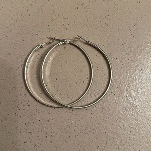 Silver hoop earrings never wore before